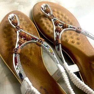 Beautiful European tan and white sandals